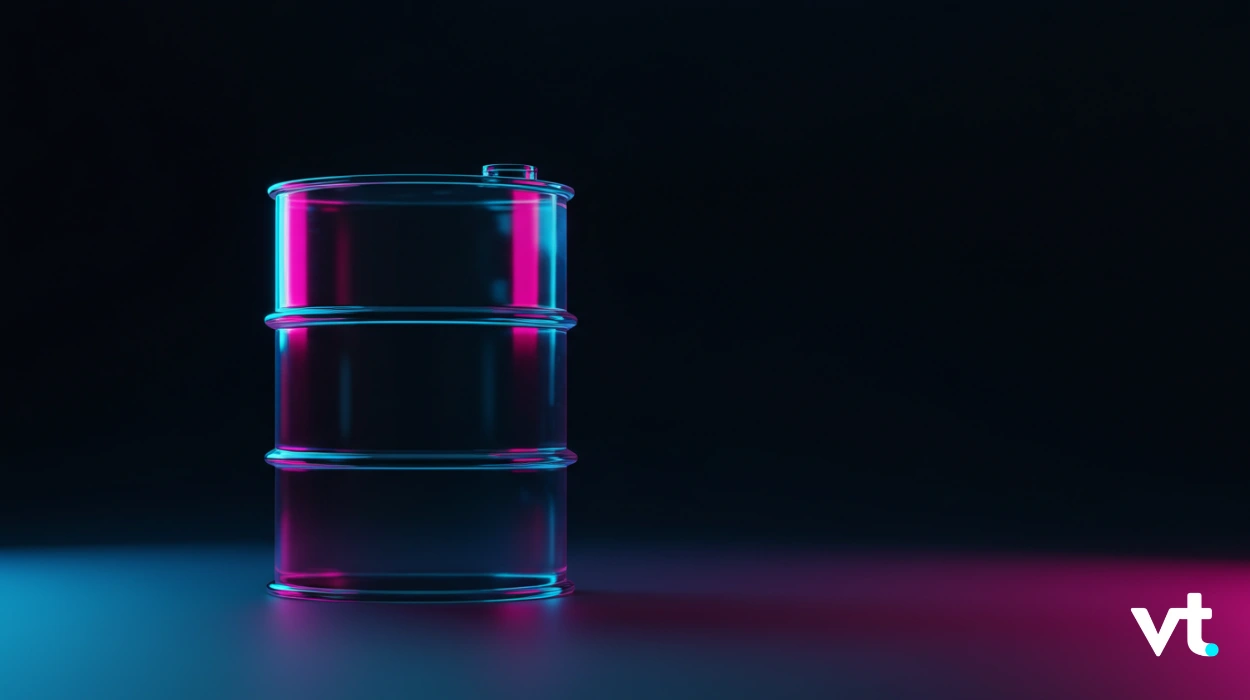 Three stacked steel oil drums illuminated by blue and pink neon light against a dark background; VT logo bottom right.